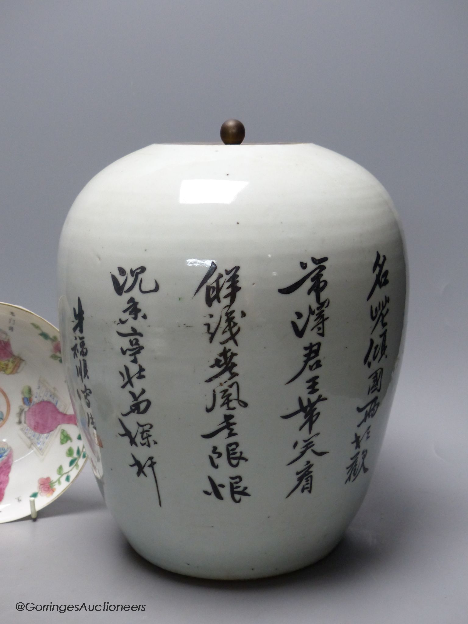 A 19th century famille rose bowl and stand, a blue and white cup, a famille rose jar and a stone carving of two monkeys